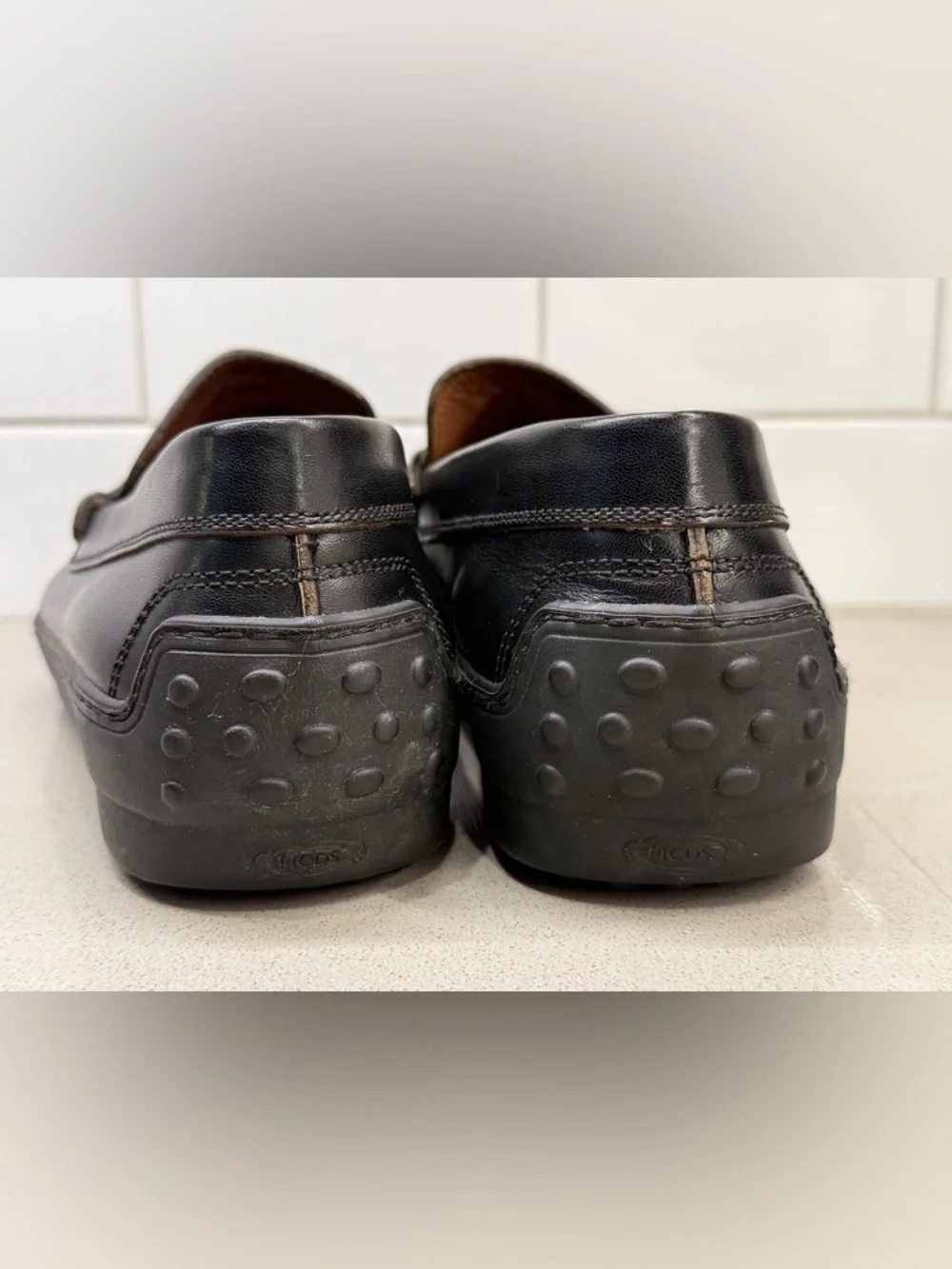 Tod's Black Leather Penny Loafers for Men